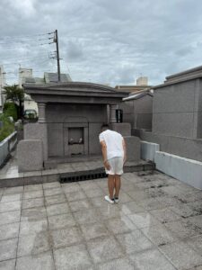 Author Colin Wee visiting with his protagonist Anko Itosu, Makabi Cemetary, Okinawa Oct 2025